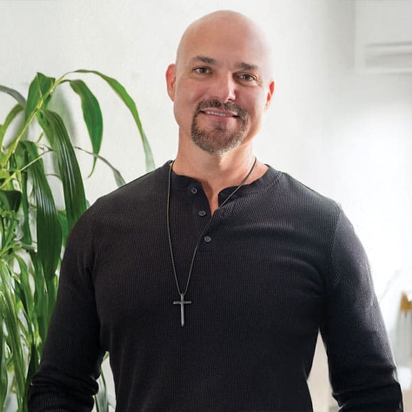 Professional headshot of Michael Marchena, Temecula-based Realtor and Home Loan Specialist, smiling in business casual attire.